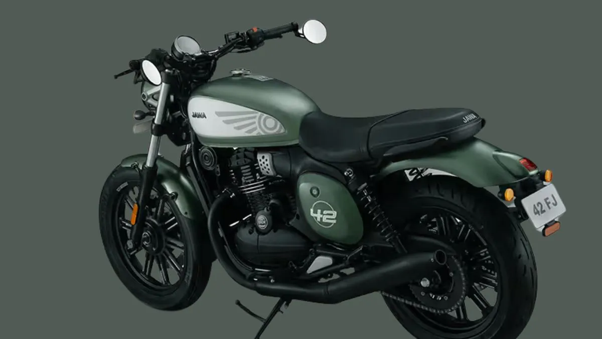  Jawa 42 FJ side profile showing aluminum tank and twin exhaust
