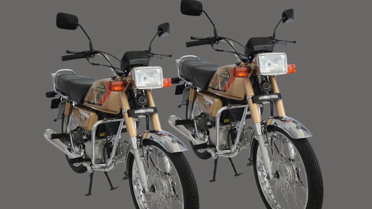 Side look of Honda CD 100 with clean panel and large fuel tank
